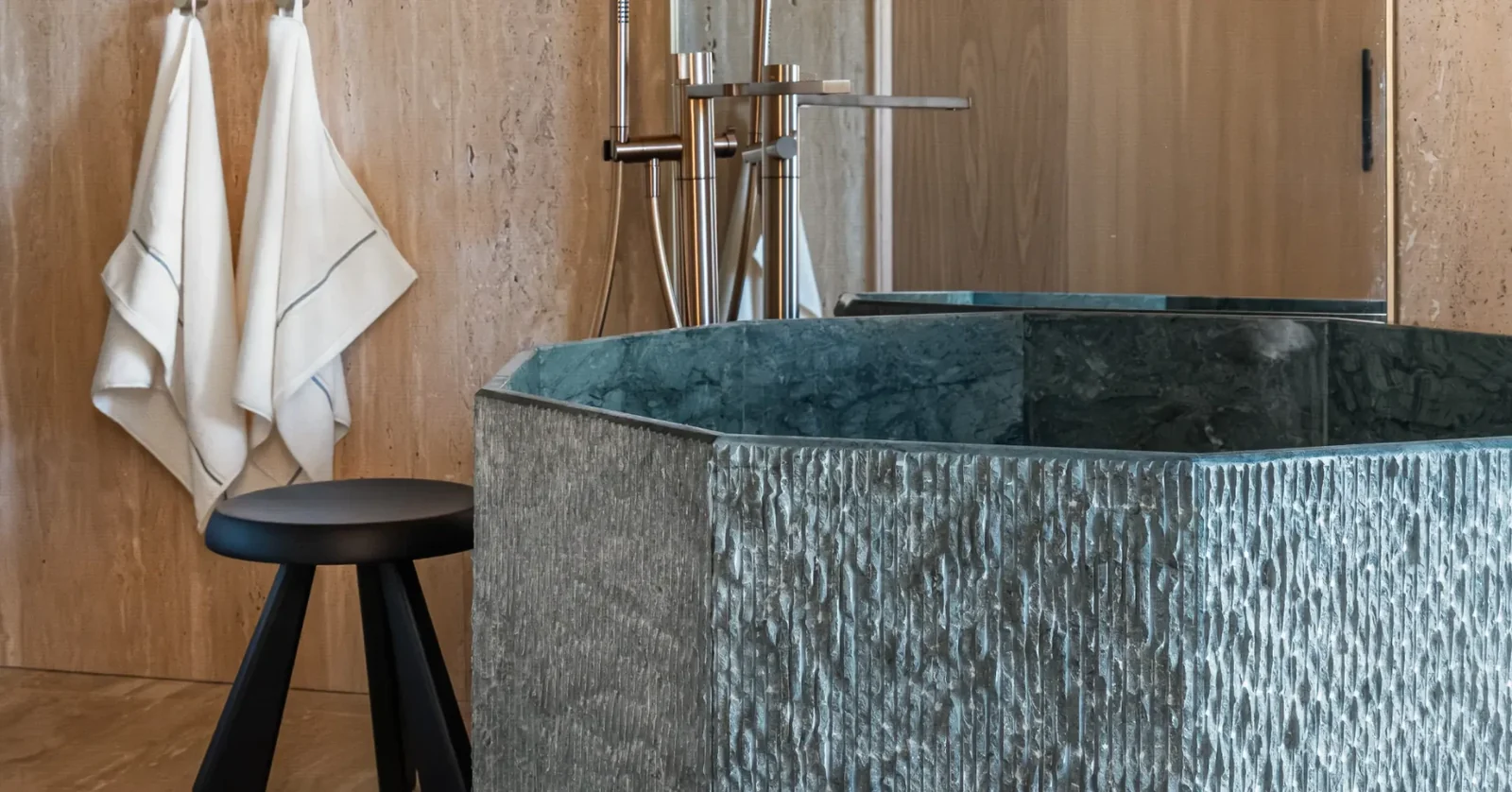 Casa Lamar showroom — sculptural stone bathtub